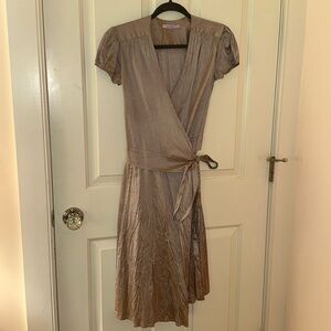 Iridescent champagne Calypso wrap dress. NWOT